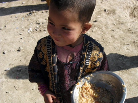 Aschiana - boy with meal