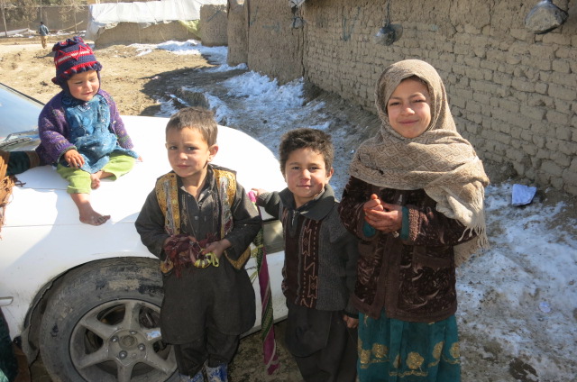 young children waiting for Mylar blanket